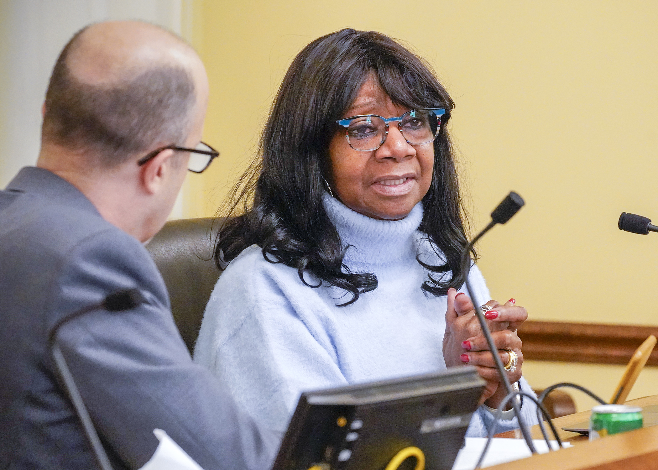 Joyce Hayden, a gun violence survivor, testifies before the House Public Safety Finance and Policy Committee Feb. 3 in support of a bill that would require criminal background checks for firearm transfers. (Photo by Andrew VonBank)